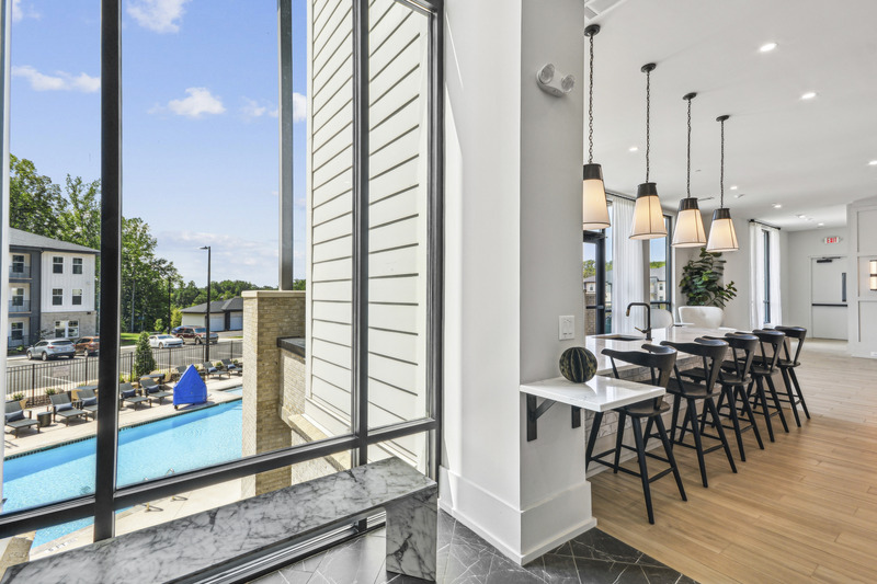 thesutton_clubhousepoolview-1-_august2024_lowres