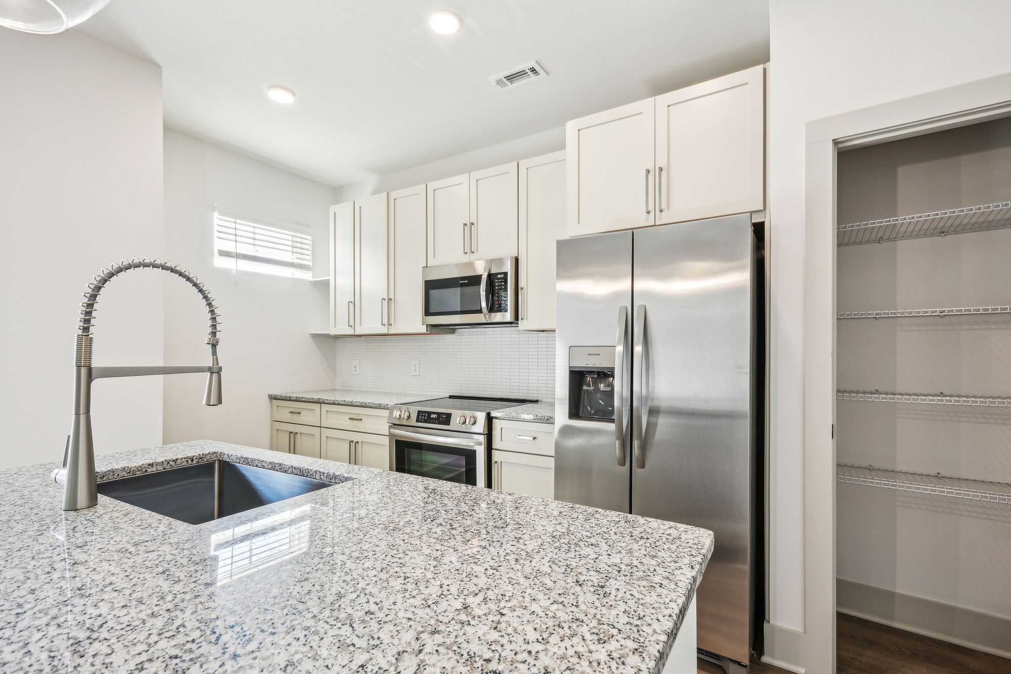 thesutton_vacantmodellkitchen-1-_september2024_highres